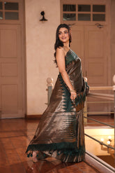 KAVVYA SOFT & LIGHT WEIGHT BOTTLE GREEN HANDLOOM SAREE WITH ALLOVER GOLDEN ZARI WEAVING ,BIG TEMPLE BORDER AND PALLU COMES WITH SAME COLOUR HEAVY BLOUSE